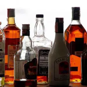 Alcohol bottles on bar counter